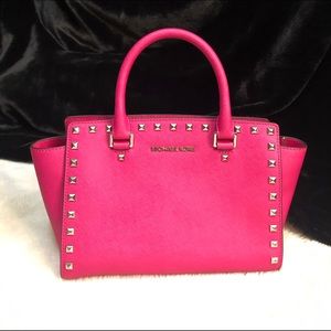 Michael Kors studded fushia leather bag